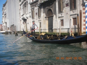 This is what the usual picture of Venice looks like:  Grand Canal and gondoliers.